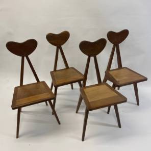A Set of Four Folk Art Wooden Chairs